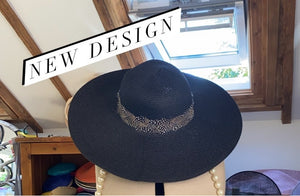 Feathered floppy hat